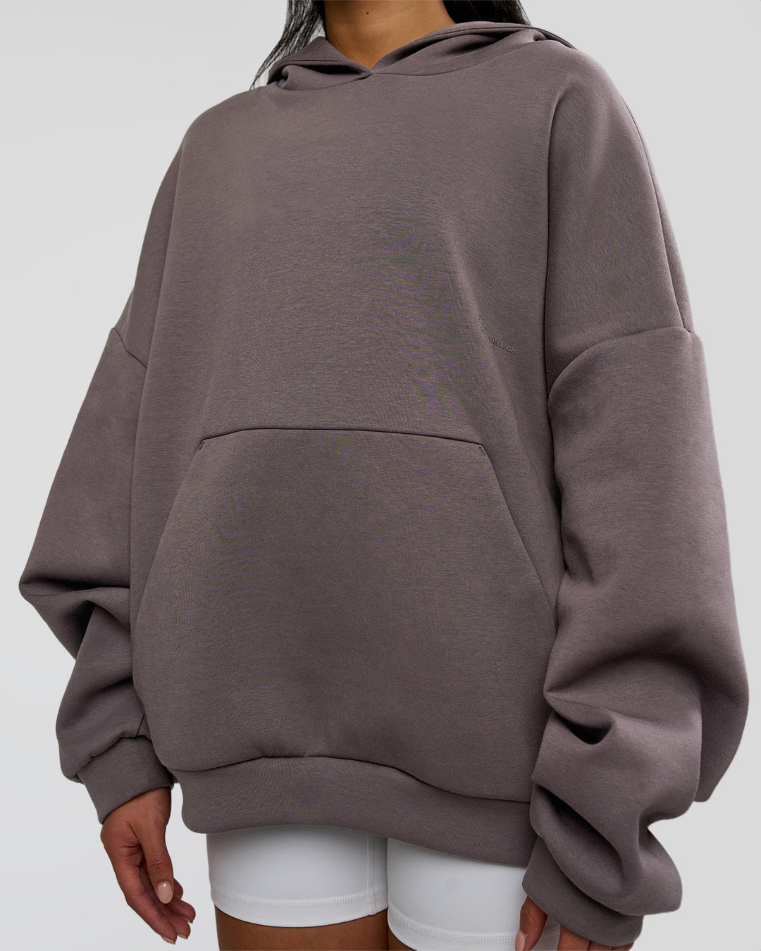 Woman wearing AfterDark ZeroCrease Oversized Hoodie - Duskstone | Model:Loren | Size:XS - view 9