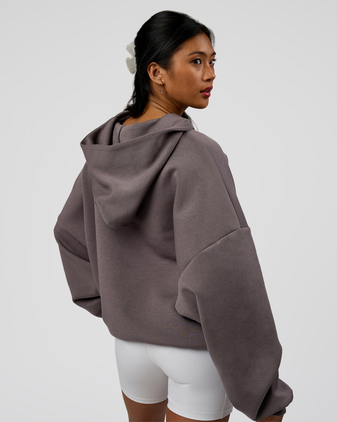 Woman wearing AfterDark ZeroCrease Oversized Hoodie - Duskstone | Model:Loren | Size:XS - view 8