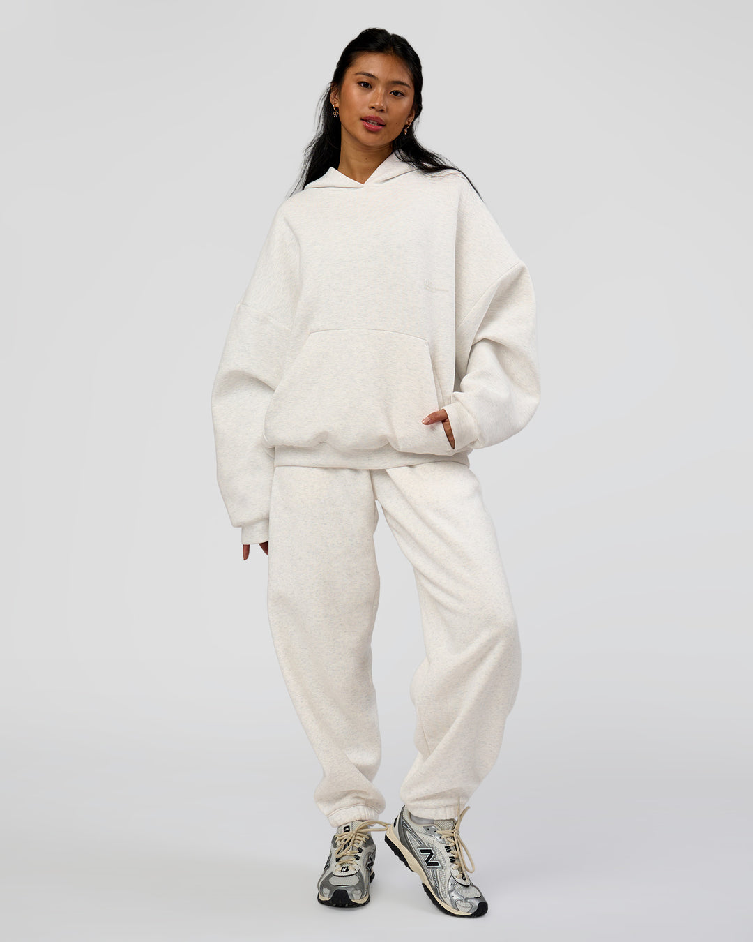 Woman wearing AfterDark ZeroCrease Oversized Hoodie - Silver Marl | Model:Loren |Size:XS - view 12