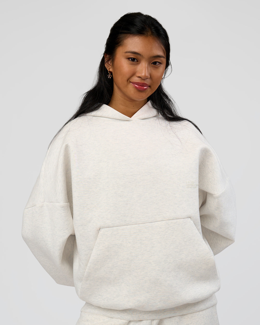 Woman wearing AfterDark ZeroCrease Oversized Hoodie - Silver Marl | Model:Loren |Size:XS - view 4