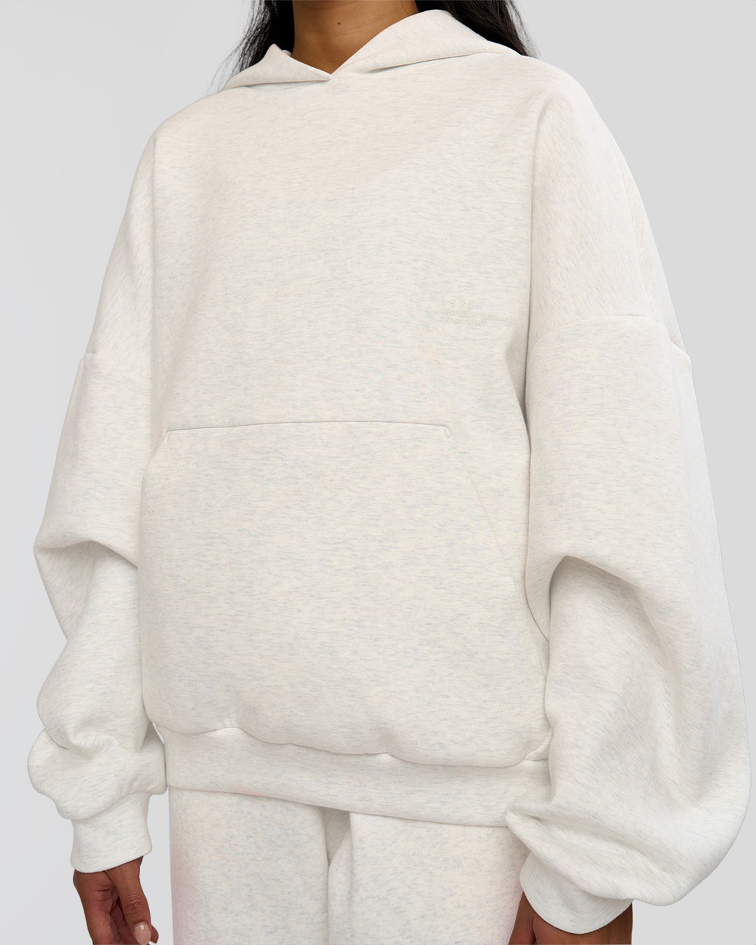 Woman wearing AfterDark ZeroCrease Oversized Hoodie - Silver Marl | Model:Loren |Size:XS - view 13