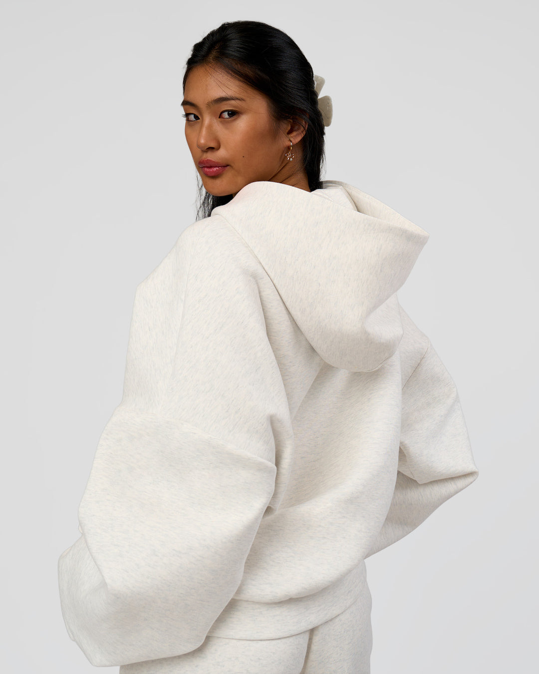 Woman wearing AfterDark ZeroCrease Oversized Hoodie - Silver Marl | Model:Loren |Size:XS - view 8