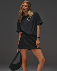 Woman wearing AfterDark ZeroCrease Oversized Tee - Black | Model:Leilani | Size:XS | Thumbnail Index: 7