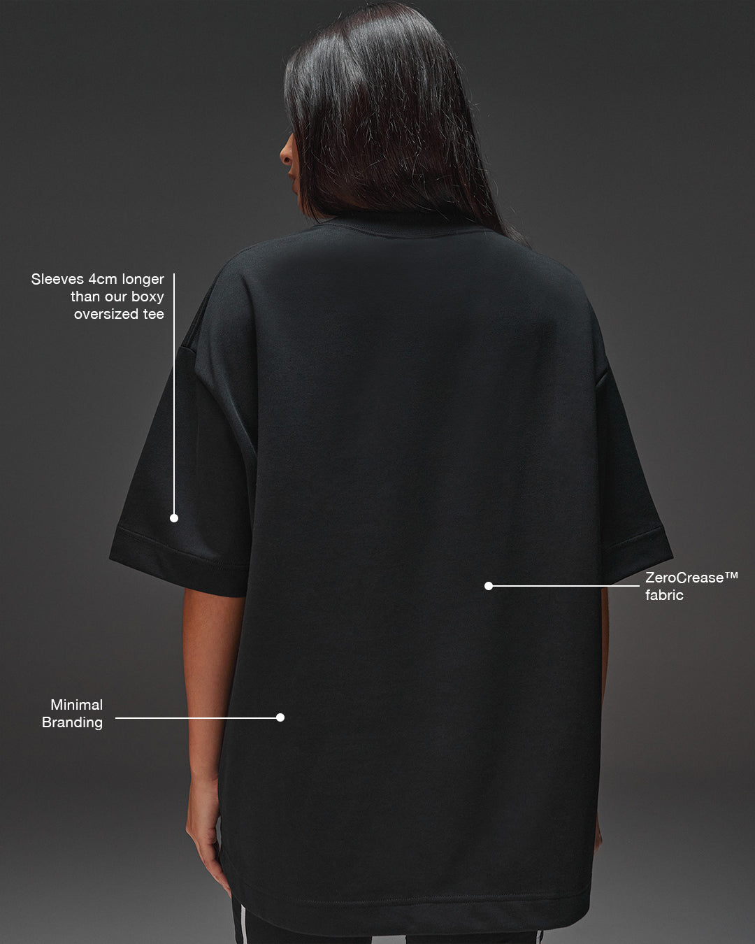 Woman wearing AfterDark ZeroCrease Oversized Tee - Black | Model:Ruby | Size:XS - view 7