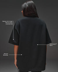 Woman wearing AfterDark ZeroCrease Oversized Tee - Black | Model:Ruby | Size:XS | Thumbnail Index: 6
