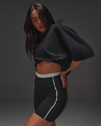 Woman wearing AfterDark ZeroCrease Oversized Tee - Black | Model:Ruby | Size:XS | Thumbnail Index: 5