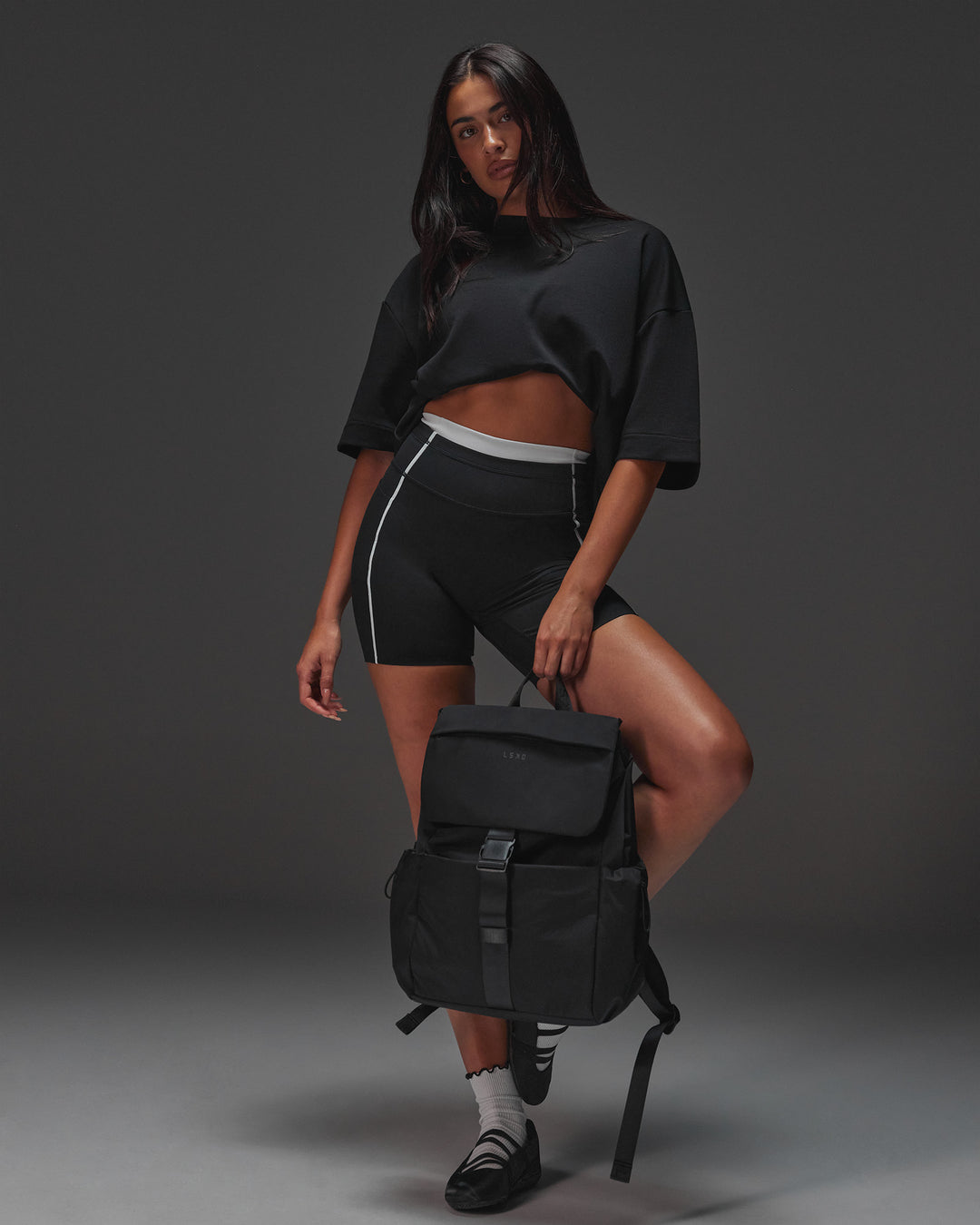 Woman wearing AfterDark ZeroCrease Oversized Tee - Black | Model:Ruby | Size:XS - view 9