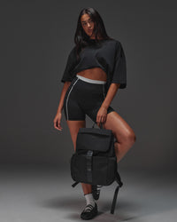 Woman wearing AfterDark ZeroCrease Oversized Tee - Black | Model:Ruby | Size:XS | Thumbnail Index: 8
