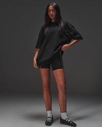 Woman wearing AfterDark ZeroCrease Oversized Tee - Black | Model:Ruby | Size:XS | Thumbnail Index: 12
