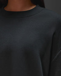 Woman wearing AfterDark ZeroCrease Oversized Tee - Black | Model:Ruby | Size:XS | Thumbnail Index: 13