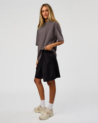 Woman wearing AfterDark ZeroCrease Oversized Tee - Duskstone | Model:Georgia | Size:XS | Thumbnail Index: 10