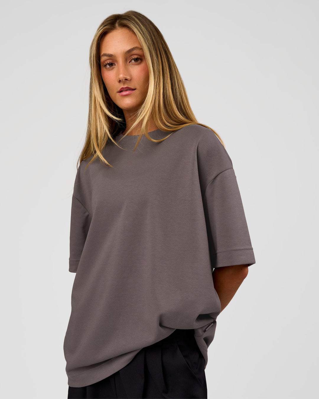 Woman wearing AfterDark ZeroCrease Oversized Tee - Duskstone | Model:Georgia | Size:XS - view 4