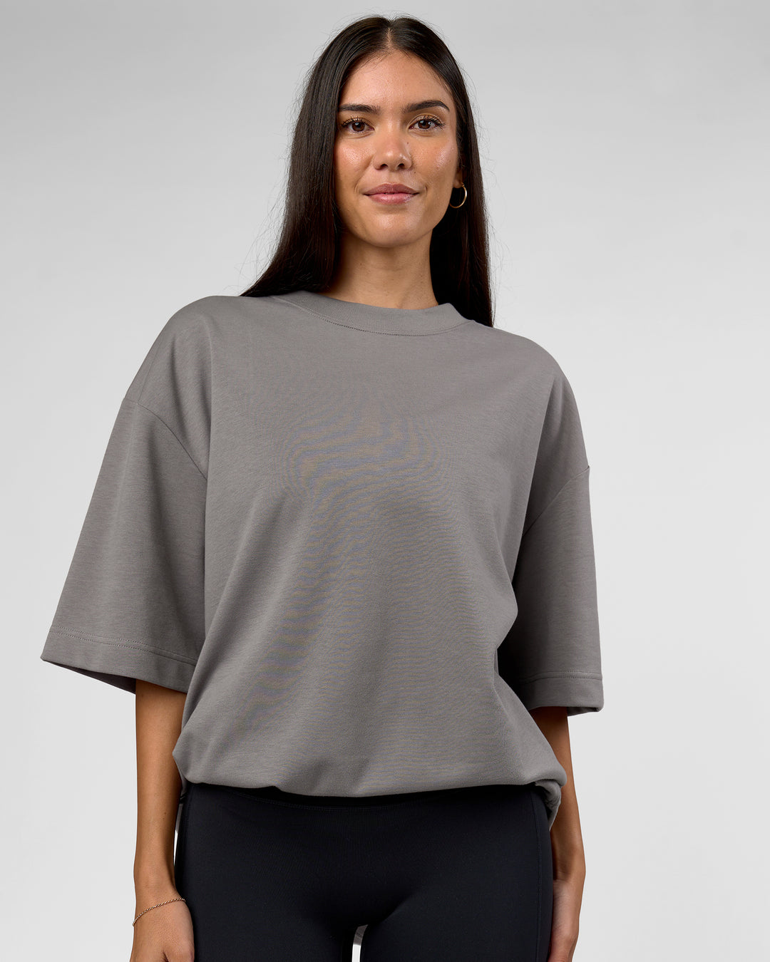 Woman wearing AfterDark ZeroCrease Oversized Tee - Storm Front | Model:Rhylee | Size:XS - view 4