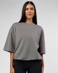Woman wearing AfterDark ZeroCrease Oversized Tee - Storm Front | Model:Rhylee | Size:XS | Thumbnail Index: 3