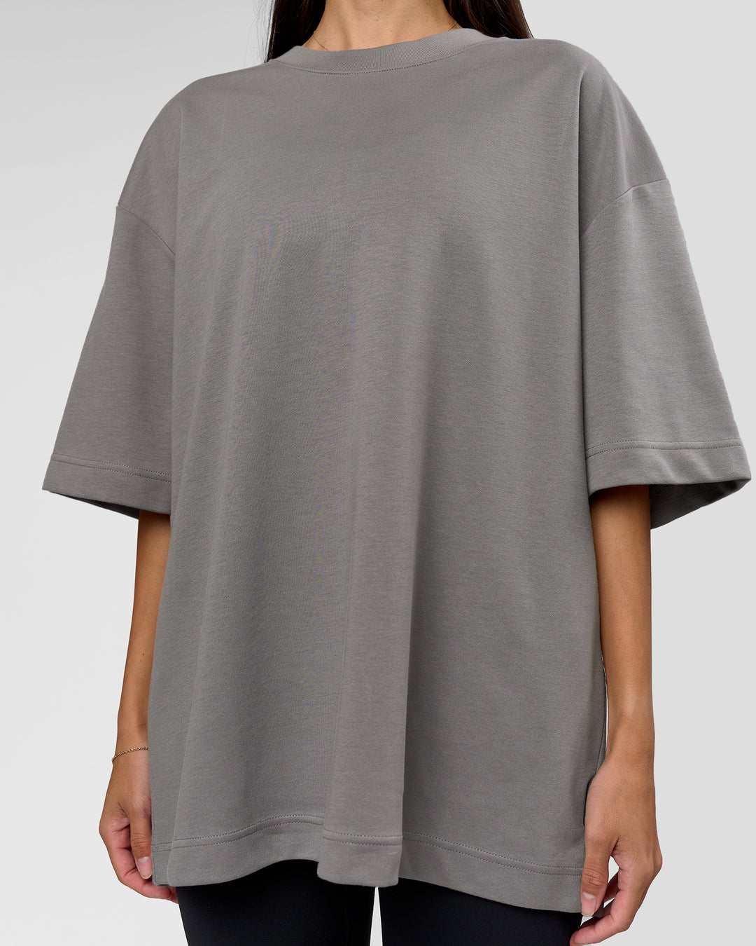 Woman wearing AfterDark ZeroCrease Oversized Tee - Storm Front | Model:Rhylee | Size:XS - view 14