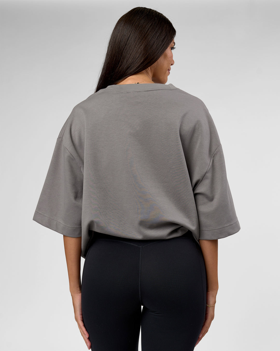Woman wearing AfterDark ZeroCrease Oversized Tee - Storm Front | Model:Rhylee | Size:XS - view 5