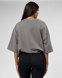 Woman wearing AfterDark ZeroCrease Oversized Tee - Storm Front | Model:Rhylee | Size:XS | Thumbnail Index: 4