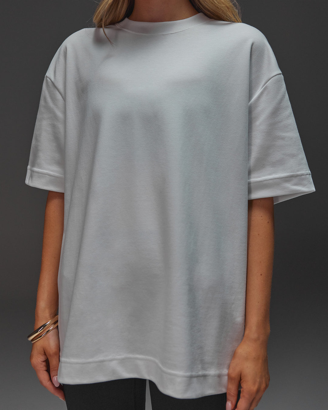 Woman wearing AfterDark ZeroCrease Oversized Tee - White | Model:Leilani | Size:XS - view 18