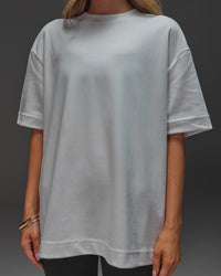 Woman wearing AfterDark ZeroCrease Oversized Tee - White | Model:Leilani | Size:XS | Thumbnail Index: 17