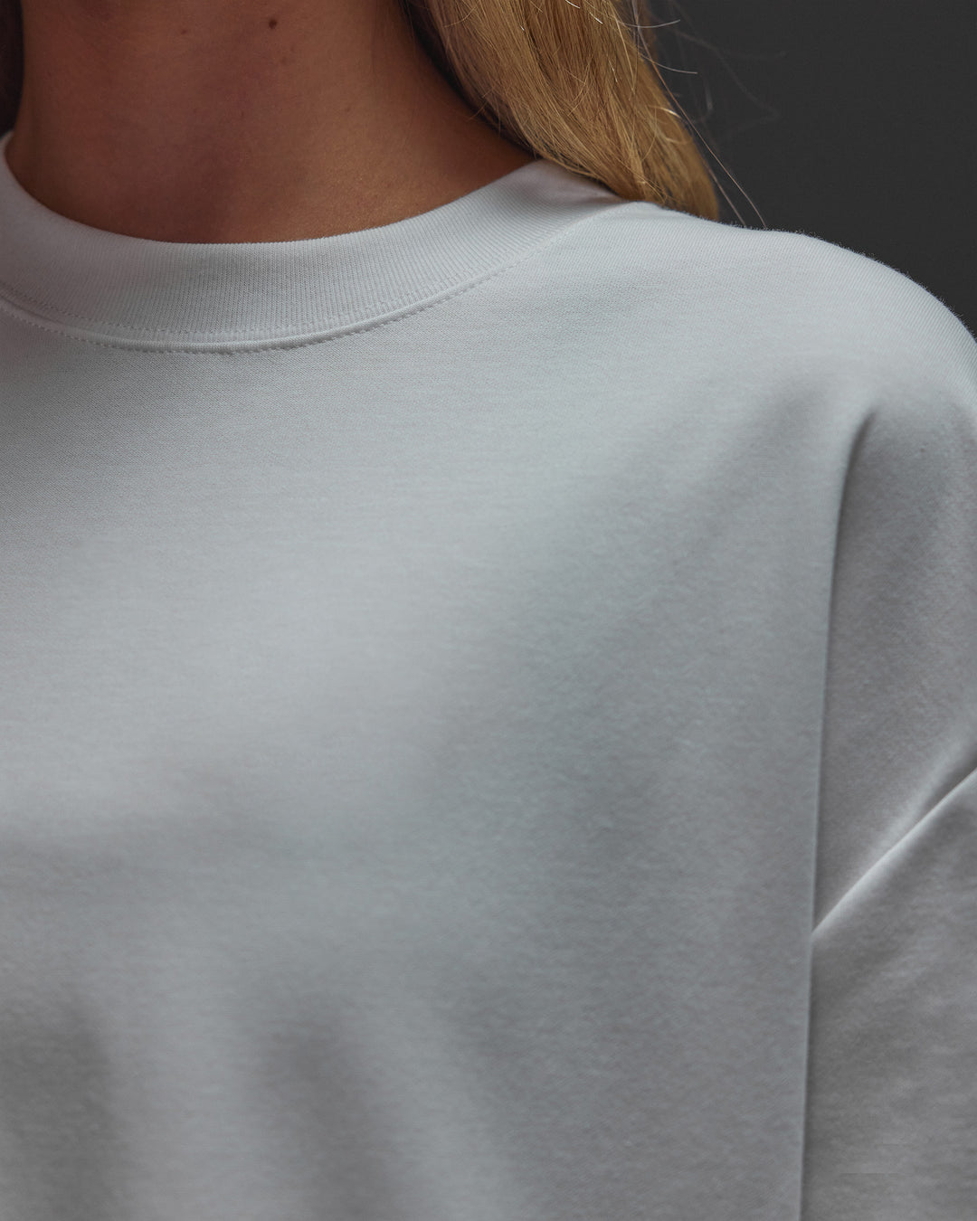 Woman wearing AfterDark ZeroCrease Oversized Tee - White | Model:Leilani | Size:XS - view 16