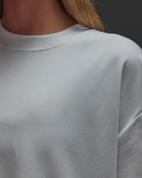 Woman wearing AfterDark ZeroCrease Oversized Tee - White | Model:Leilani | Size:XS | Thumbnail Index: 15