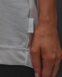 Woman wearing AfterDark ZeroCrease Oversized Tee - White | Model:Leilani | Size:XS | Thumbnail Index: 16