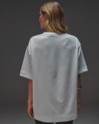 Woman wearing AfterDark ZeroCrease Oversized Tee - White | Model:Leilani | Size:XS | Thumbnail Index: 12