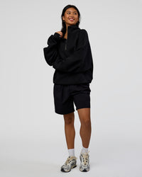 Woman wearing AfterDark ZeroCrease Quarter Zip - Black | Model:Loren | Size:XS | Thumbnail Index: 8