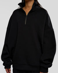 Woman wearing AfterDark ZeroCrease Quarter Zip - Black | Model:Loren | Size:XS | Thumbnail Index: 3
