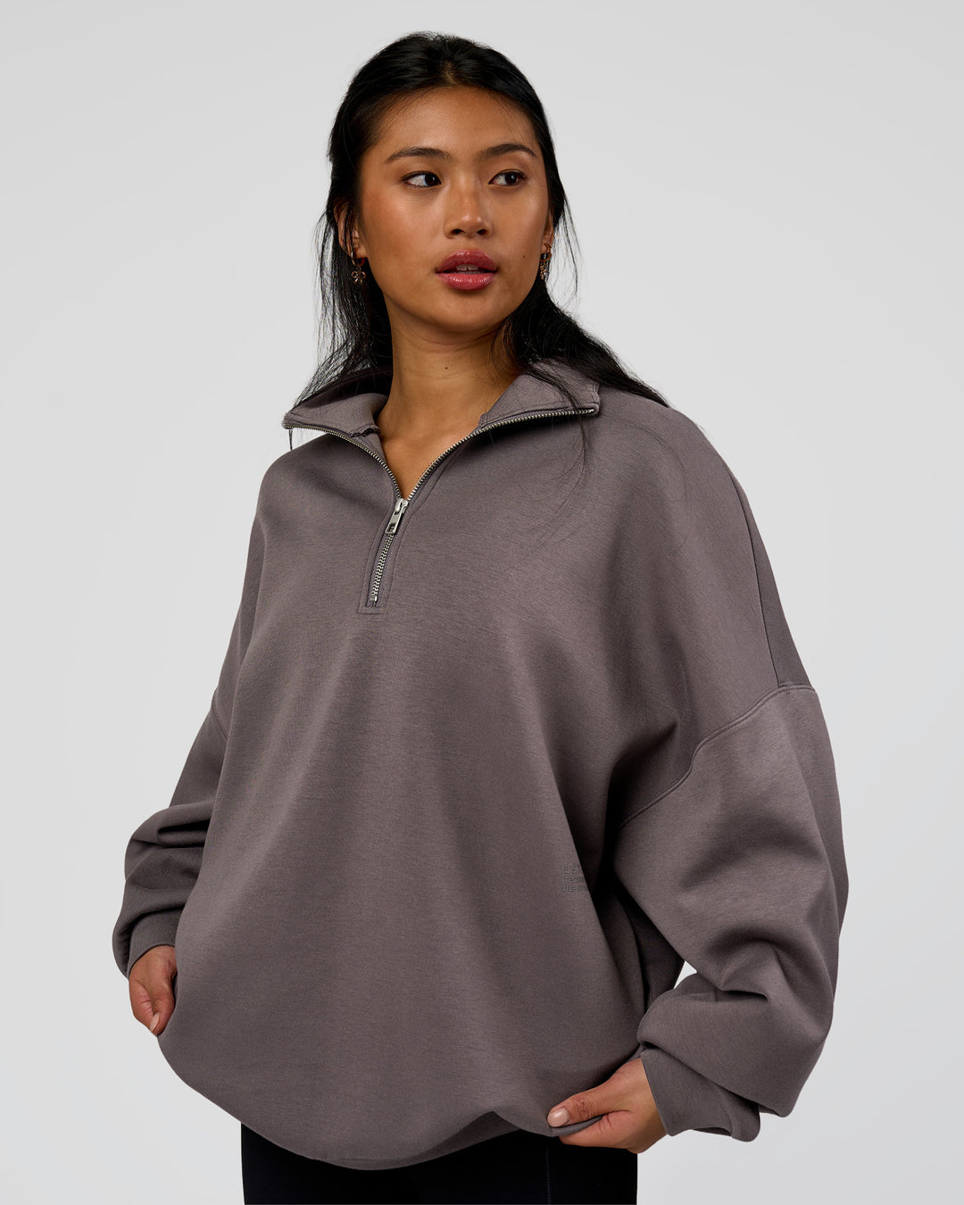 Woman wearing AfterDark ZeroCrease Quarter Zip - Duskstone | Model:Loren | Size:XS - view 4