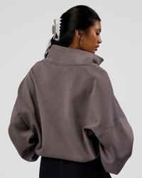 Woman wearing AfterDark ZeroCrease Quarter Zip - Duskstone | Model:Loren | Size:XS | Thumbnail Index: 7