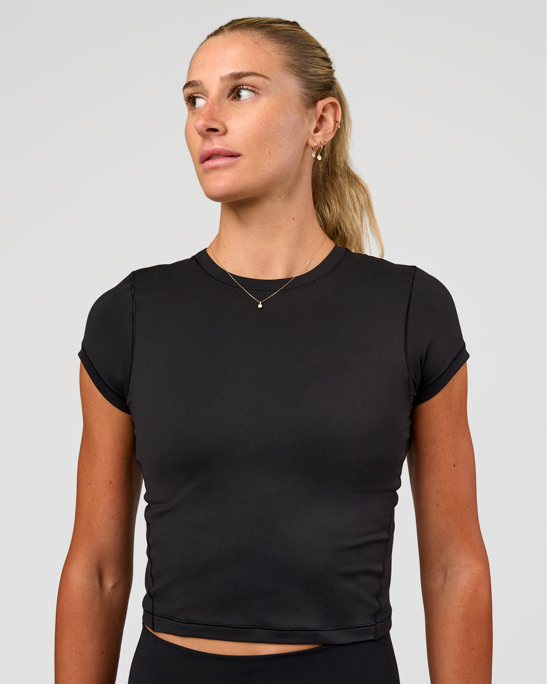 Woman wearing All Day Short Sleeve Tee - Black | Model:Emelia | Size:XS - view 3