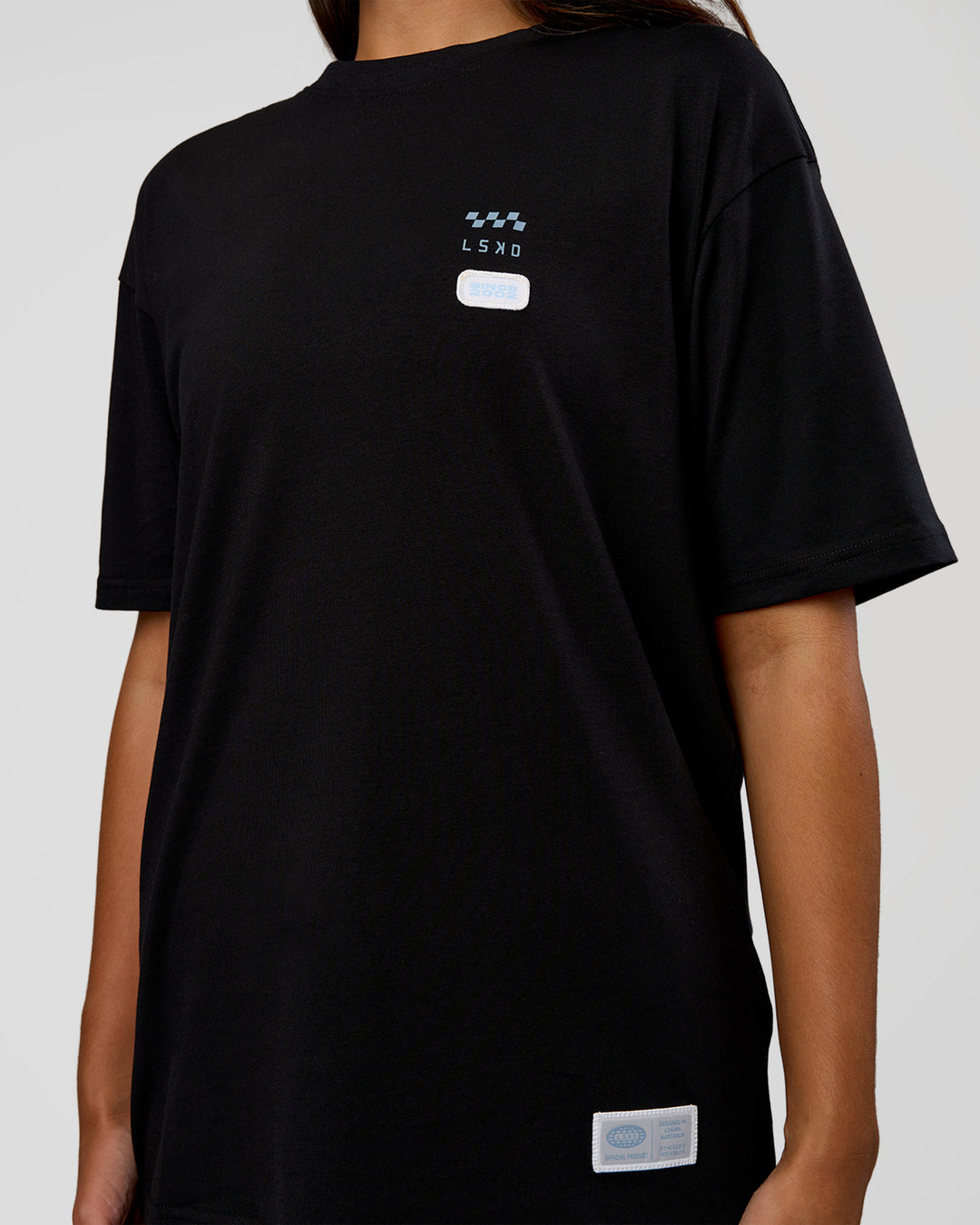 Woman wearing Archive FLXCotton Oversized Tee - Black-Open Air | Model:Kirstyn | Size:XS - view 9