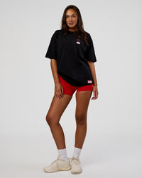 Woman wearing Archive FLXCotton Oversized Tee - Black-Scarlet | Model:Kirstyn | Size:XS | Thumbnail Index: 10
