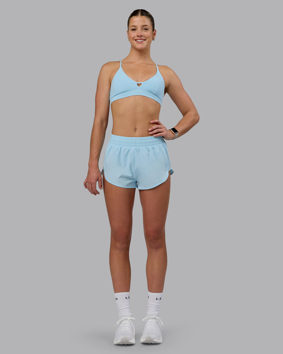 Woman wearing Ascend Sports Bra - Crystal Blue - view 6