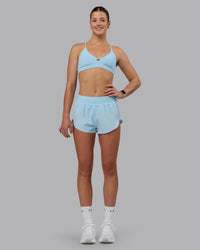 Woman wearing Ascend Sports Bra - Crystal Blue | Thumbnail Index: 5