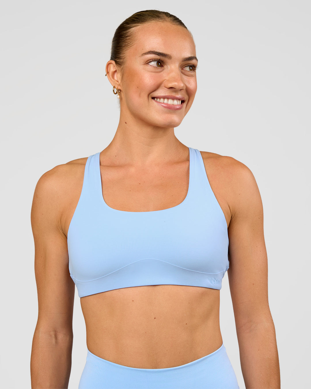 Woman wearing Aspire Sports Bra - Open Air | Model:Maja | Size:XS - view 3