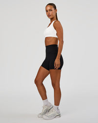 Woman wearing Aspire Sports Bra - White | Model:Brylee | Size:XS | Thumbnail Index: 5
