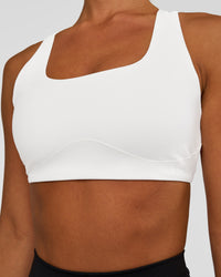 Woman wearing Aspire Sports Bra - White | Model:Brylee | Size:XS | Thumbnail Index: 3