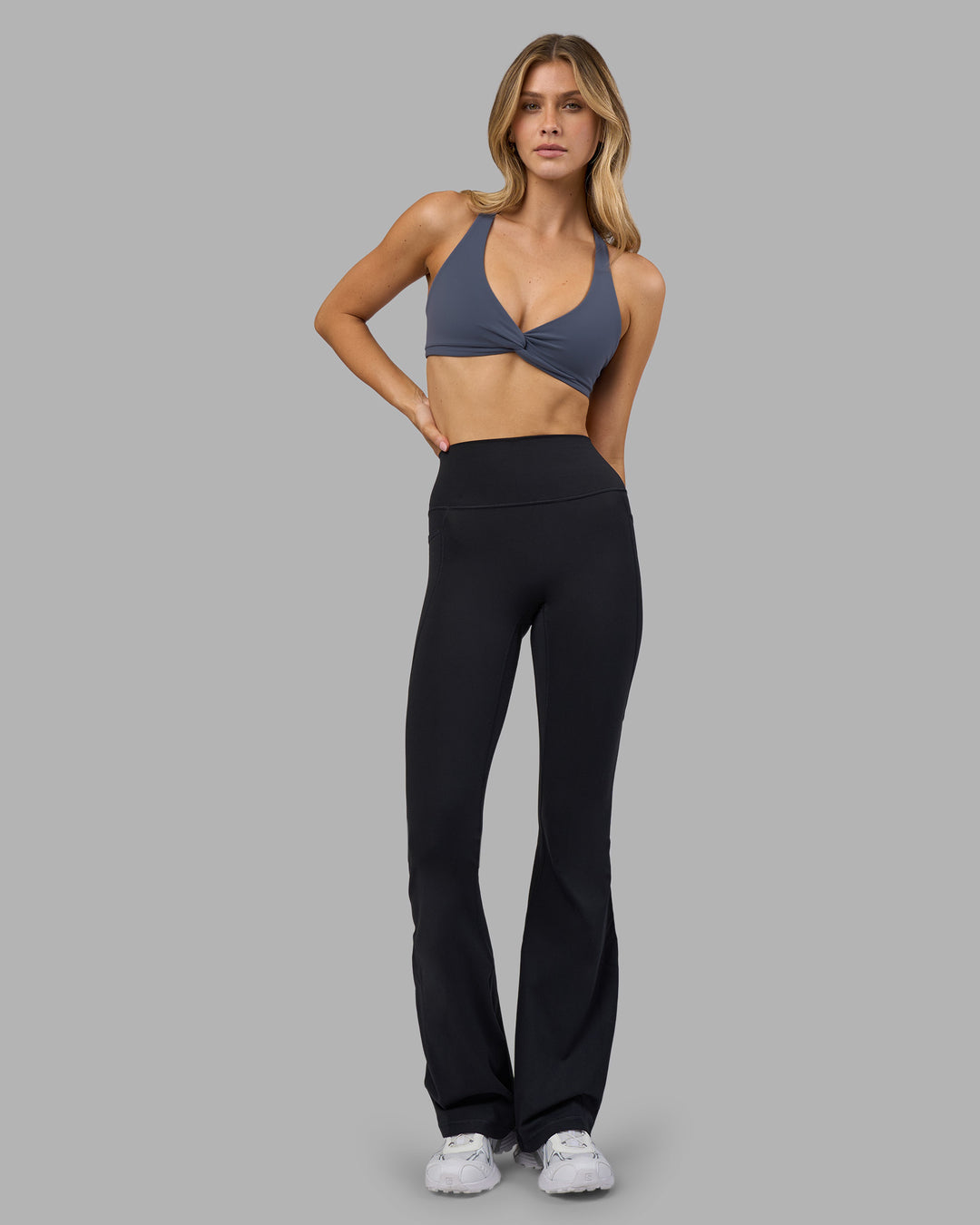 Woman wearing Aspire Twist Sports Bra - Night Shadow | Model:Leilani | Size:XS - view 7