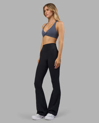 Woman wearing Aspire Twist Sports Bra - Night Shadow | Model:Leilani | Size:XS | Thumbnail Index: 7