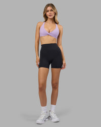 Woman wearing Aspire Twist Sports Bra - Pale Lilac | Model:Leilani | Size:XS | Thumbnail Index: 6