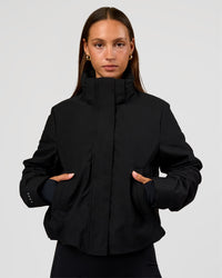 Woman wearing Auxiliary 2.0 Jacket - Black | Model:Brylee | Size:XS | Thumbnail Index: 6