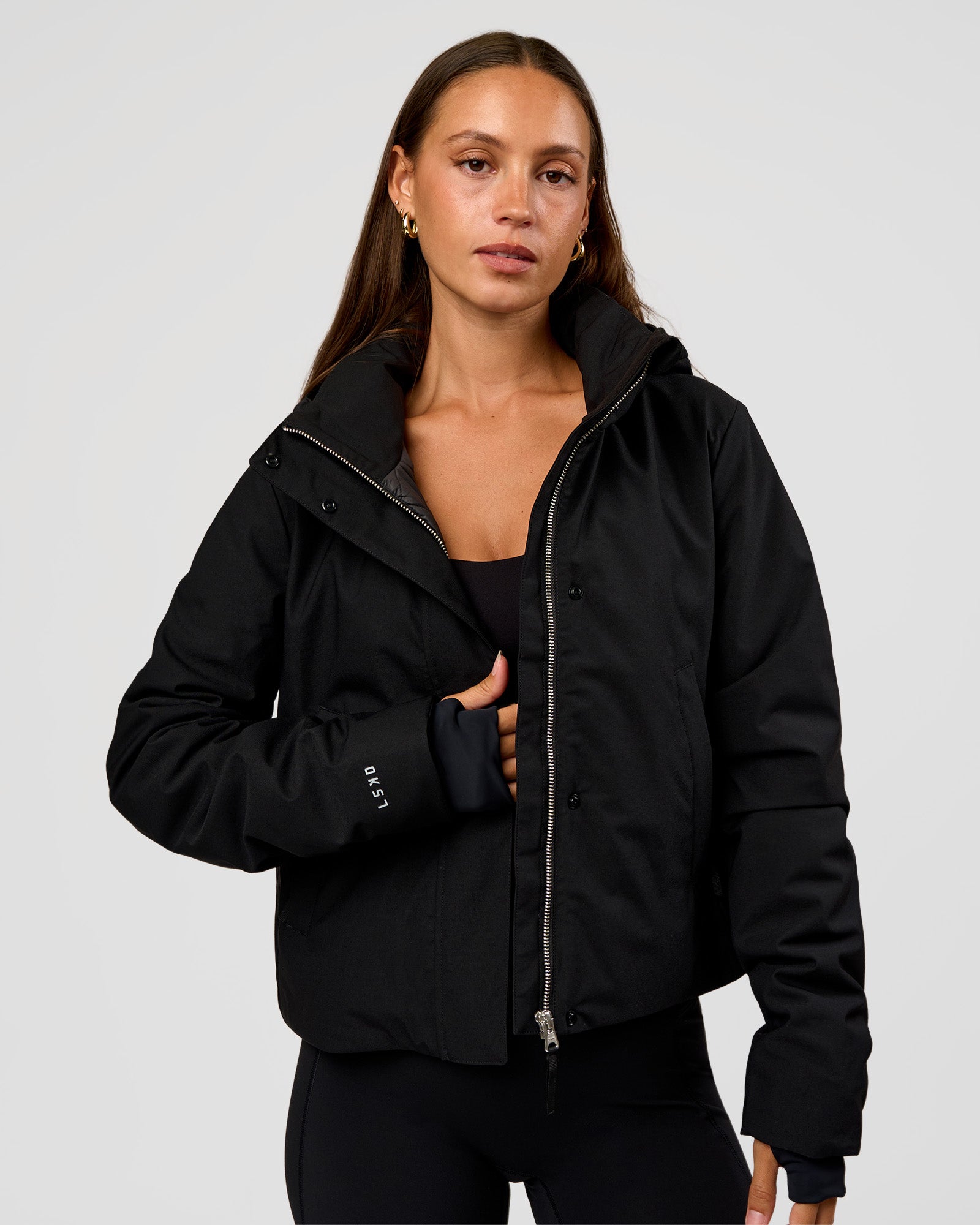 Woman wearing Auxiliary 2.0 Jacket - Black | Model:Brylee | Size:XS