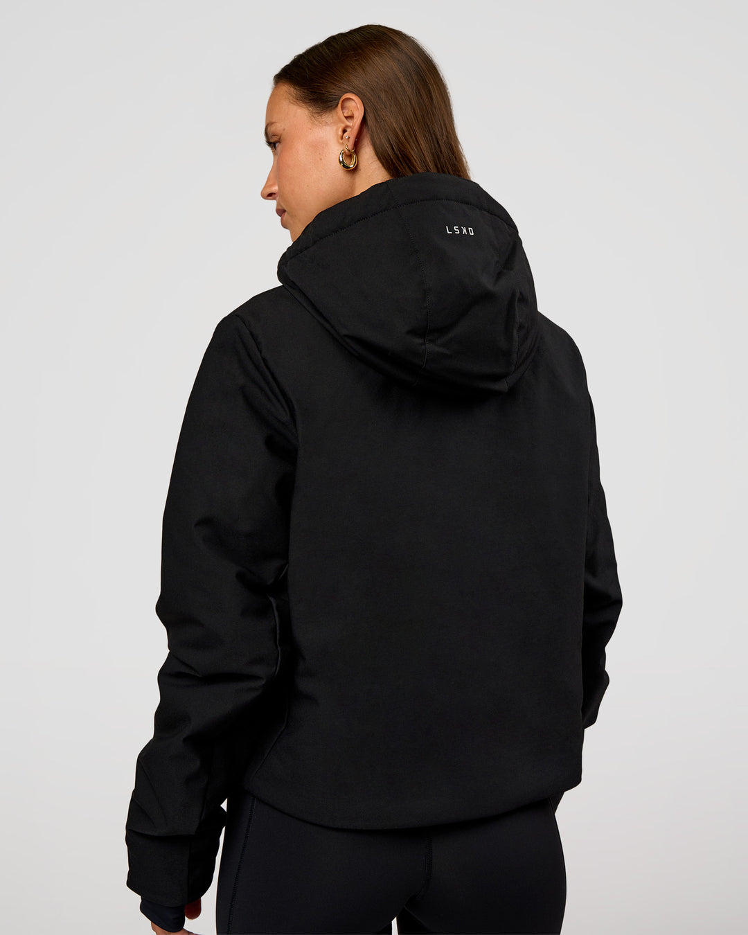 Woman wearing Auxiliary 2.0 Jacket - Black | Model:Brylee | Size:XS - view 4