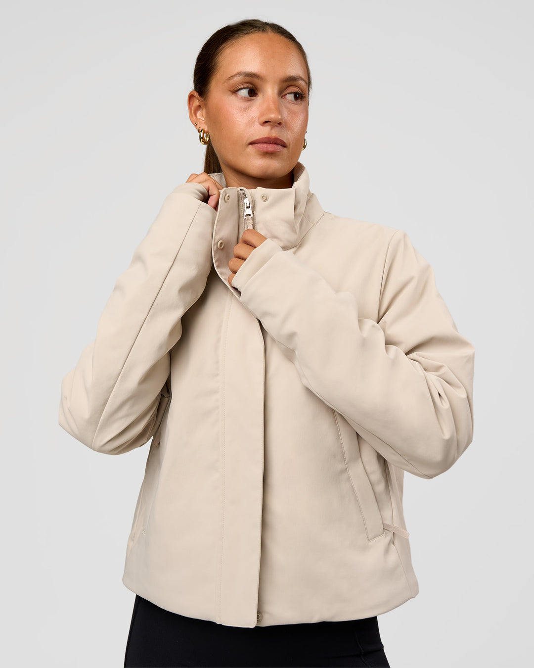 Woman wearing Auxiliary 2.0 Jacket - Shale Beige | Model:Brylee | Size:XS - view 8