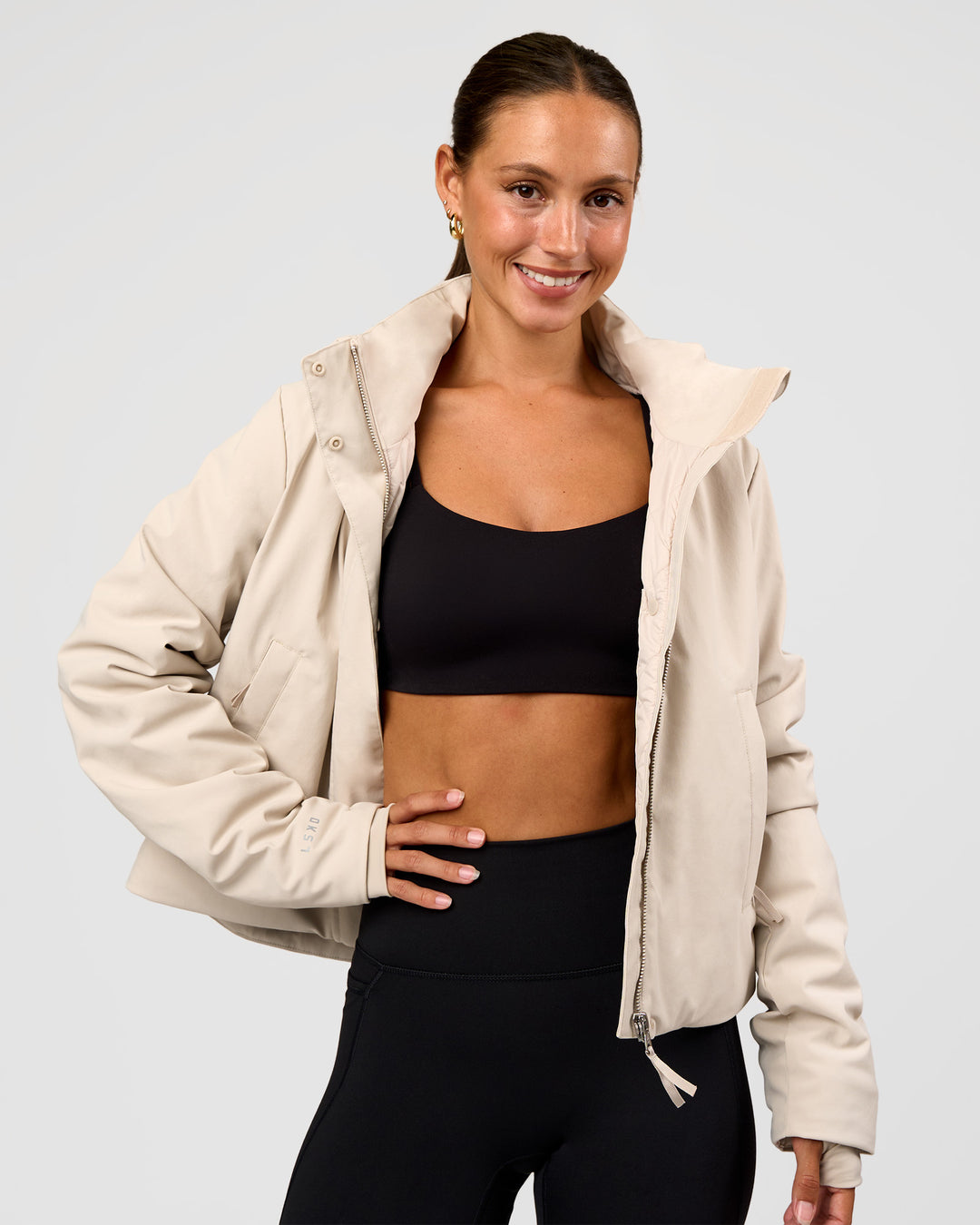 Woman wearing Auxiliary 2.0 Jacket - Shale Beige | Model:Brylee | Size:XS - view 14