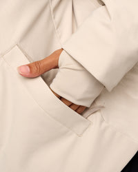 Woman wearing Auxiliary 2.0 Jacket - Shale Beige | Model:Brylee | Size:XS | Thumbnail Index: 1