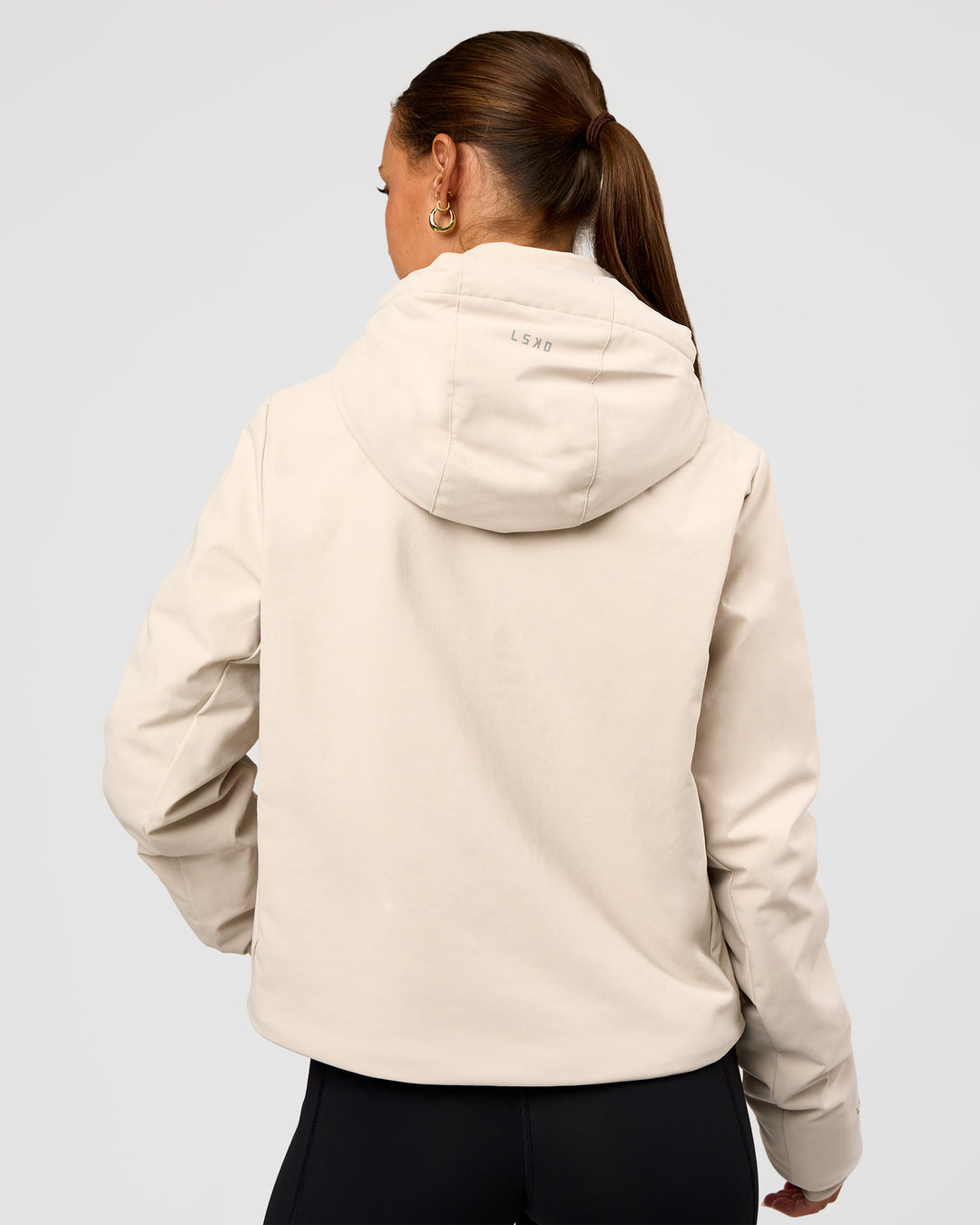 Woman wearing Auxiliary 2.0 Jacket - Shale Beige | Model:Brylee | Size:XS - view 3