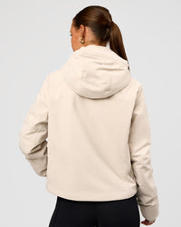 Woman wearing Auxiliary 2.0 Jacket - Shale Beige | Model:Brylee | Size:XS | Thumbnail Index: 2